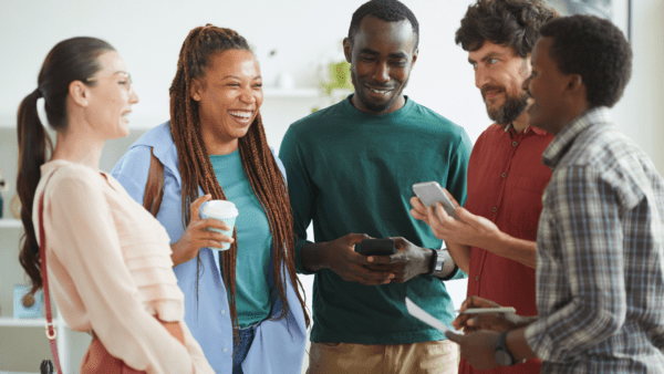 diverse people standing together talking